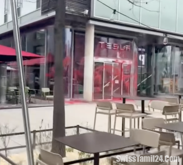 லவுசானில் உள்ள டெஸ்லா கிளையில் வண்ணப்பூச்சு : ஒருவர் கைது