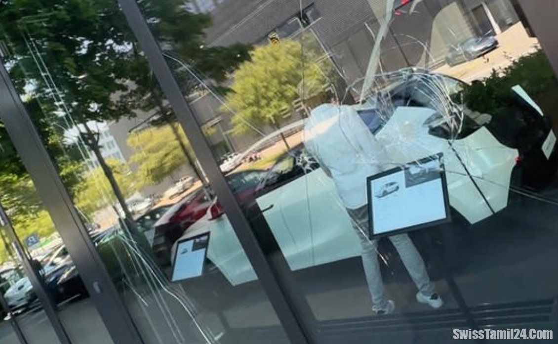 சுவிட்சர்லாந்தில் அடித்து நொறுக்கப்பட்ட டெஸ்லா கார் ஷோரூம்